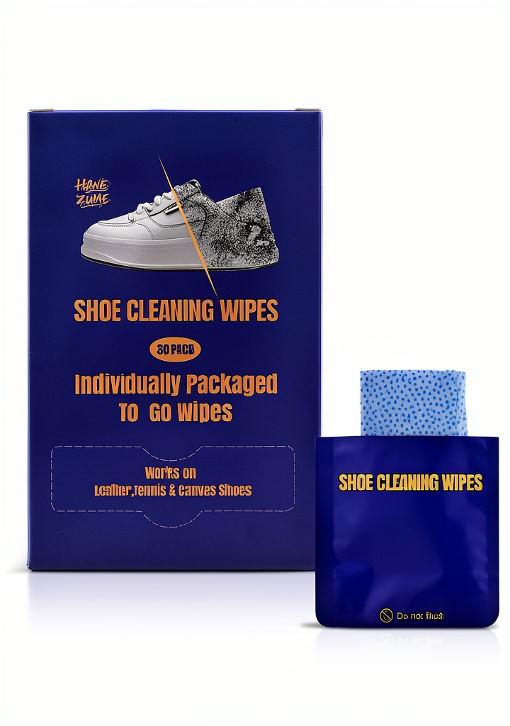 Hanezumes shoe cleaning wipes being used on a sneaker in a gym bag